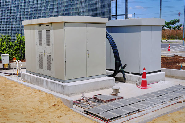 Pad-mounted transformers on a ground up electrical construction site in North Texas